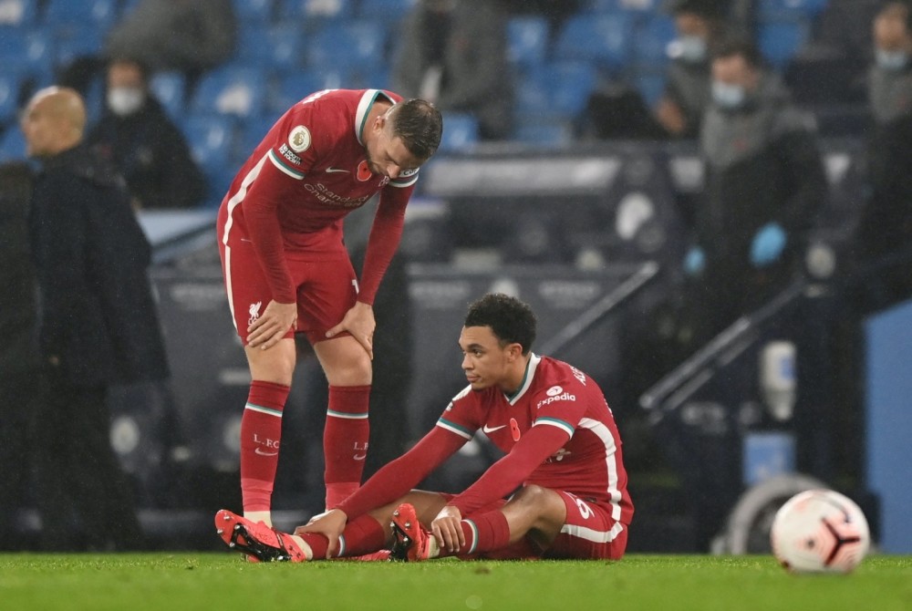  萨拉赫双响炮利物浦客场险胜狼队紧追榜首集团